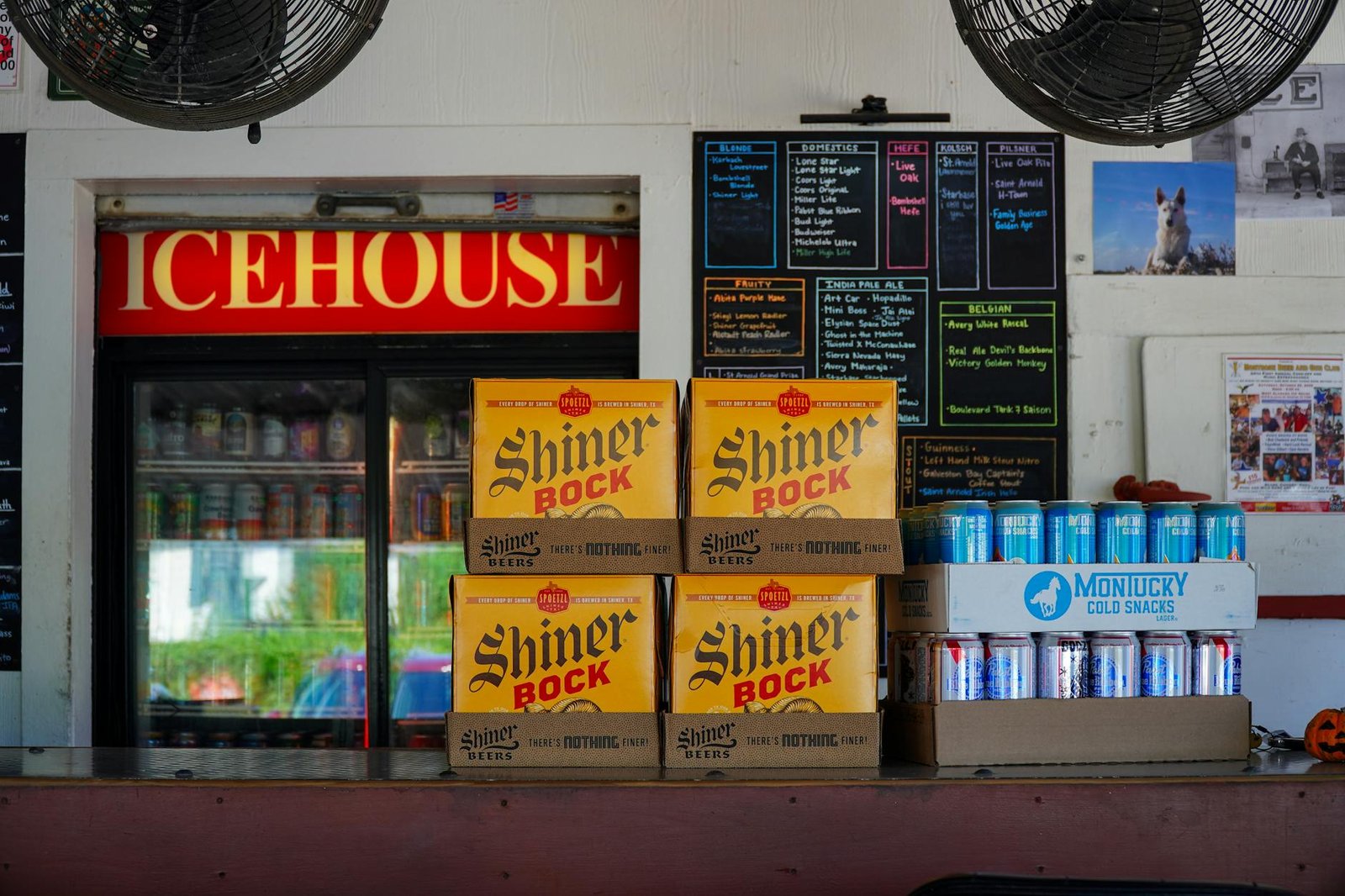 Stacks of Shiner Bock beer cases at an icehouse bar in Houston, Texas.